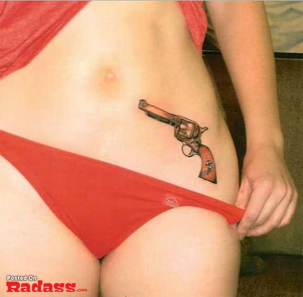 A woman sporting a gun tattoo on her stomach is among the 32 people who are packing for life.