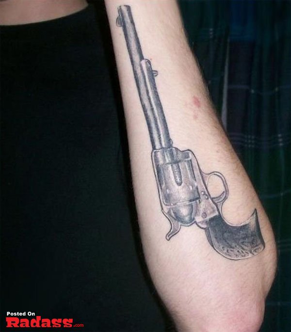 A man with a revolver tattoo.