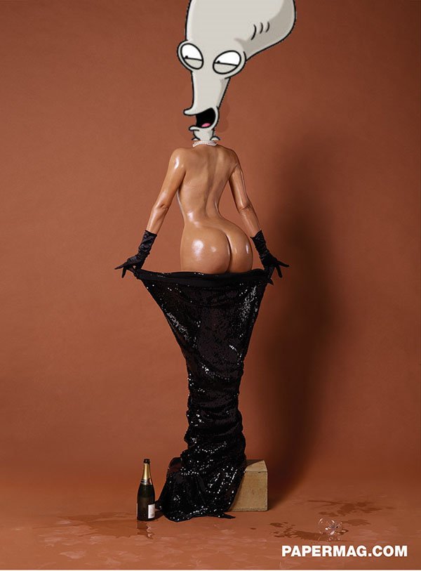 A woman in a black dress is holding a bottle of wine, captivating the internet.