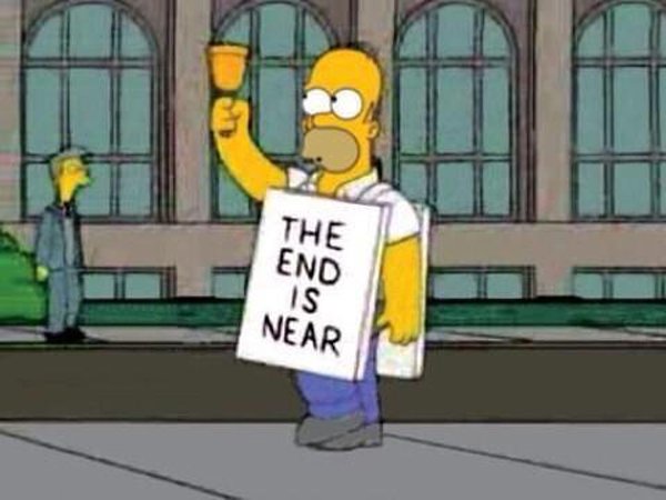 The Simpsons humorously warns that the end is near with a sign.