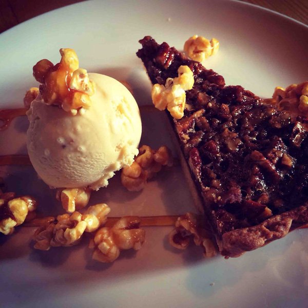 A tantalizing display of pie and ice cream that will make any food porn enthusiast indulge.