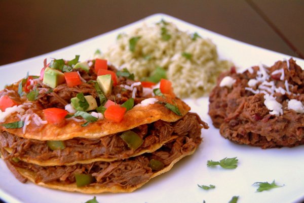 Food porn: Mexican enchiladas tantalizingly plated with rice and vegetables.