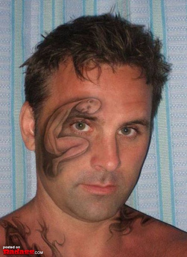 A man with a snake tattoo, representing one of his regrettable choices.