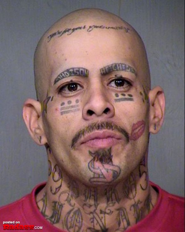 A man with regrettable face tattoos.