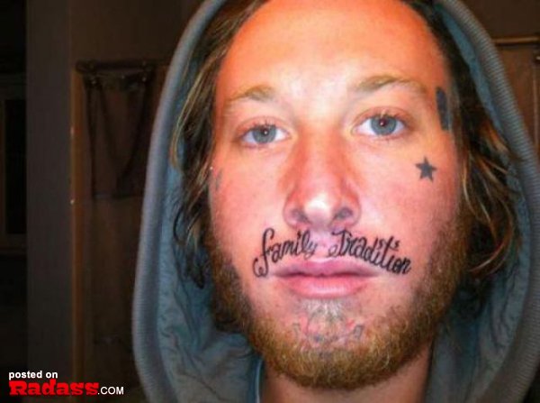 A man with a regrettable face tattoo.