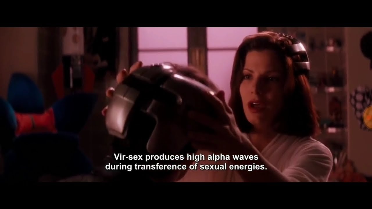 A woman in a room wearing a helmet.