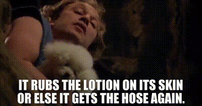 A man with a dog rubs hilarious lotion on his skin to kick start his day.