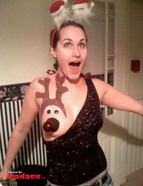 girl-you-are-strange-13 Two women standing in a garage holding a sign that says