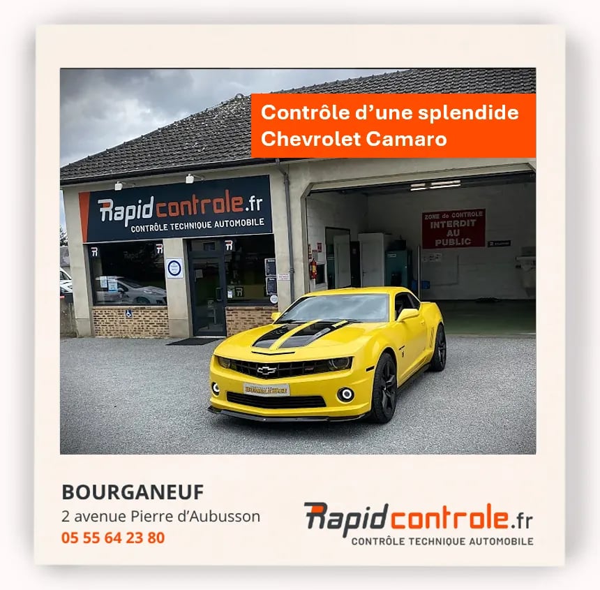 chevrolet camaro jaune devant le centre de controle technique rapidcontrole bourganeuf
