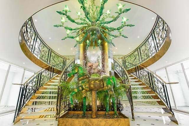 Water Walls 23 S.S. Catherine River Cruise Waterfall against Curved Elevator