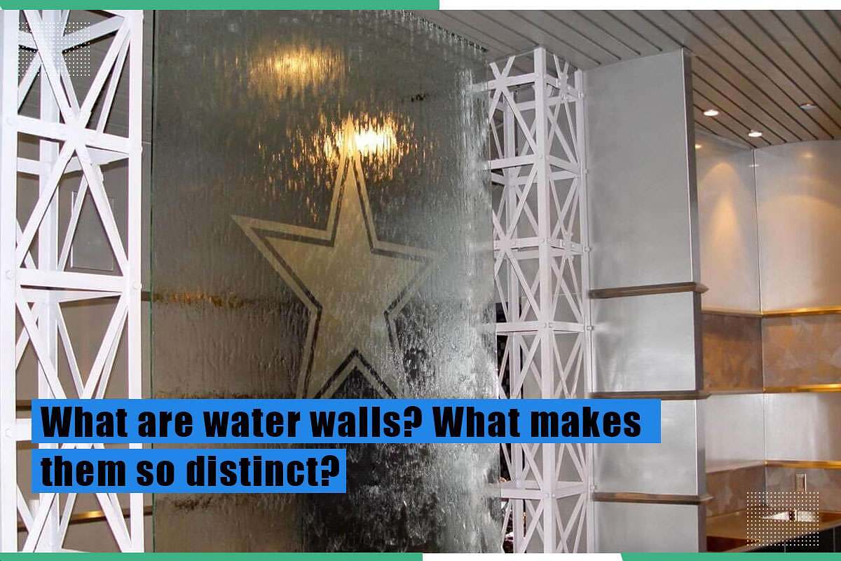 Water wall feature showcasing cascading water with a star design, framed by modern white structures, emphasizing the distinctiveness of water walls in commercial decor.