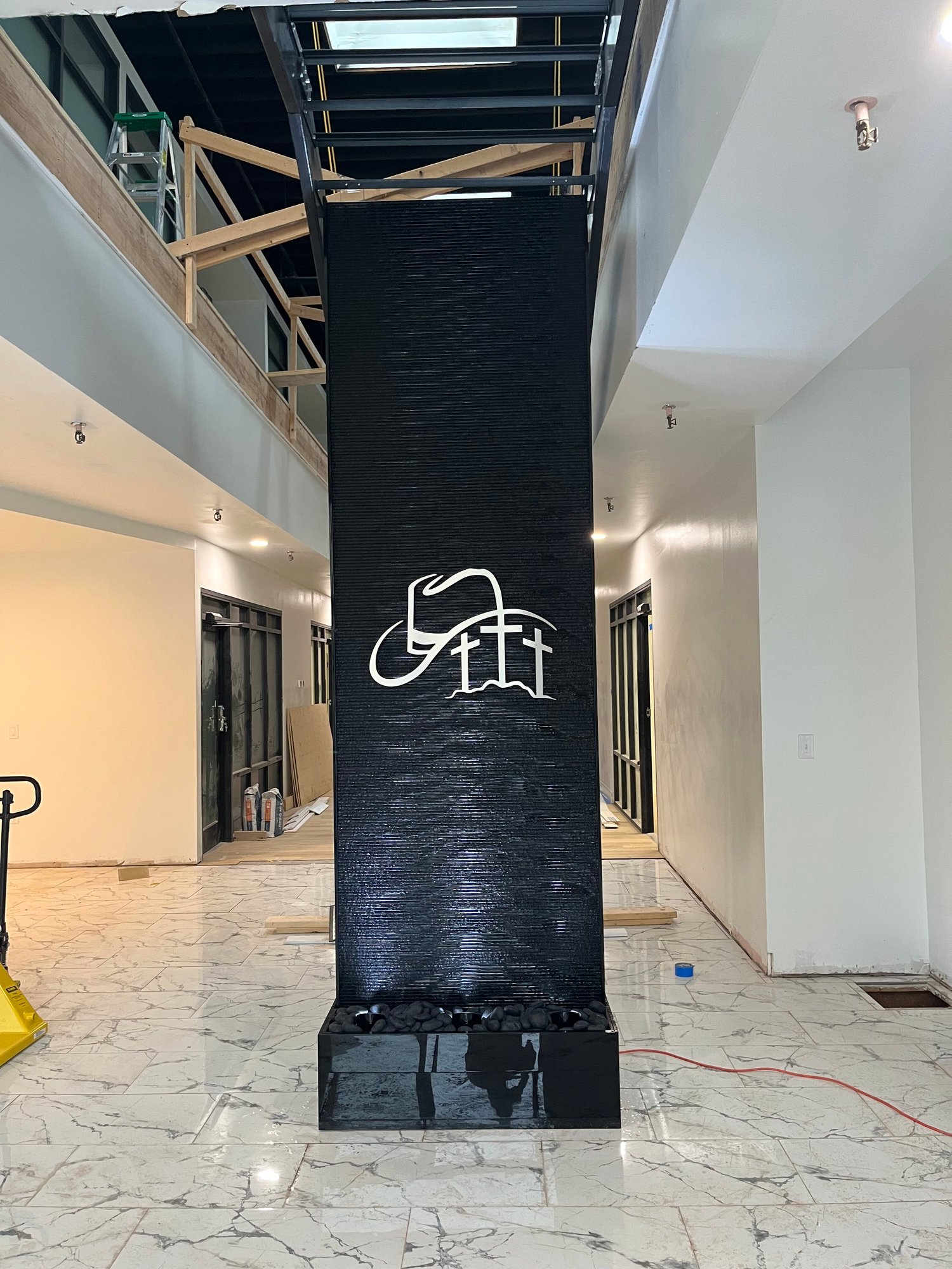Black Scored Acrylic Water Wall with Logo for Texas Black Scored Acrylic Water Wall with Logo for Texas