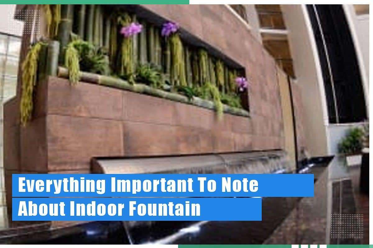 Indoor wall waterfall fountain with bamboo and purple orchids, enhancing interior spaces and promoting Feng Shui principles.