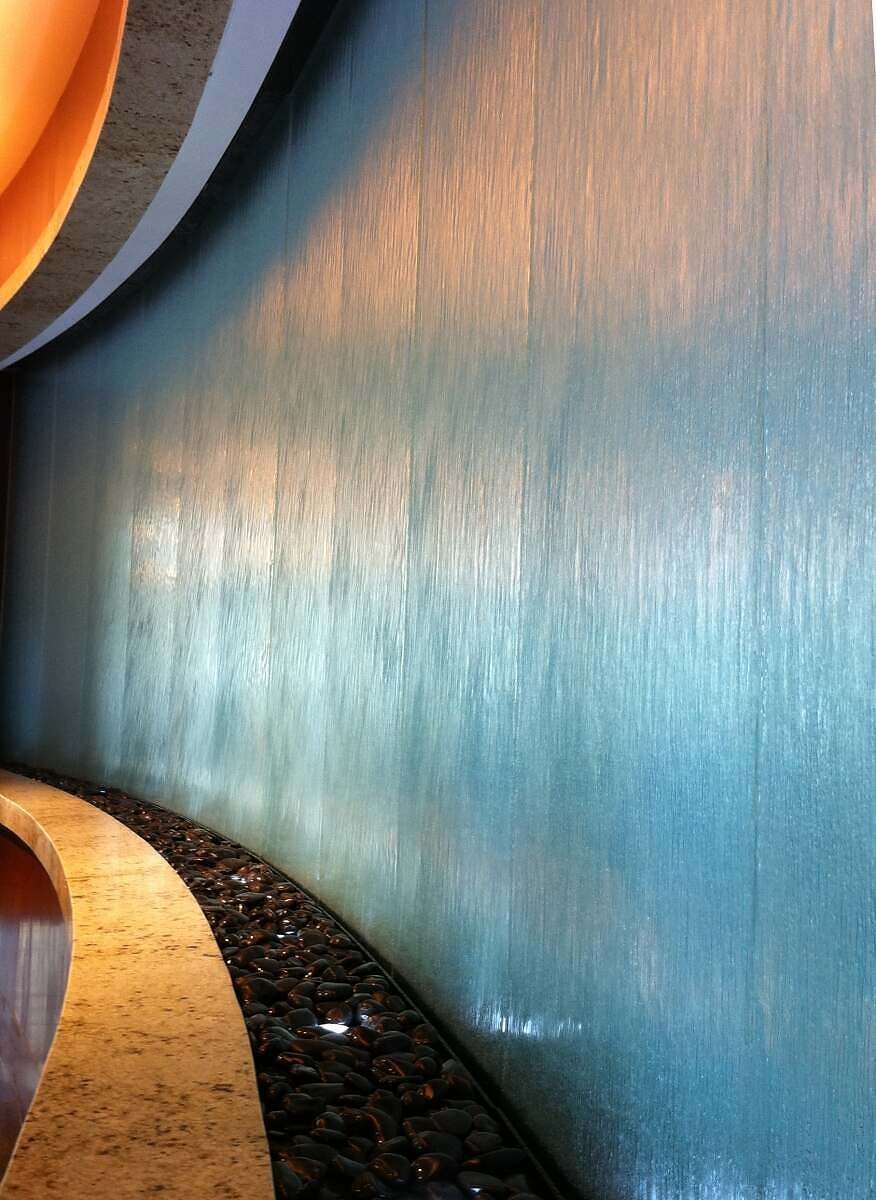 Water Walls 15 Embassy Suites Houston curved glass water wall clo
