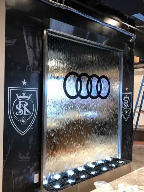 Glass Water Features 42 Mirror Glass Water Wall Waterfall For Audi Lounge at Rio Tinto Soccar Stadium in Salt Lake City Utah 4 1 rotated