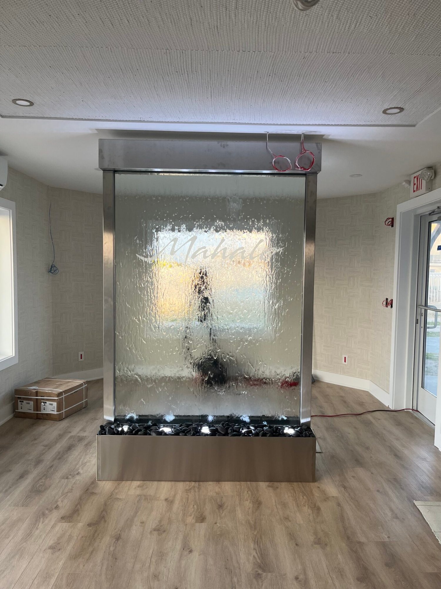 Glass Water Wall with Stainless Steel Frame and Etched Logo for Mahalo Hotel Cape May, New Jersey Glass Water Wall with Stainless Steel Frame and Etched Logo for Mahalo Hotel Cape May, New Jersey
