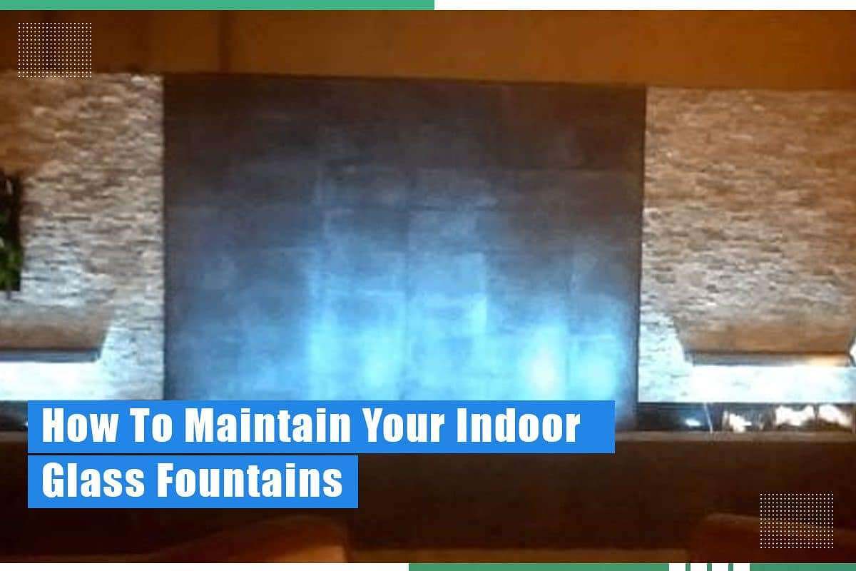 Indoor glass fountain with illuminated water feature, showcasing maintenance tips for enhancing workspace ambiance.
