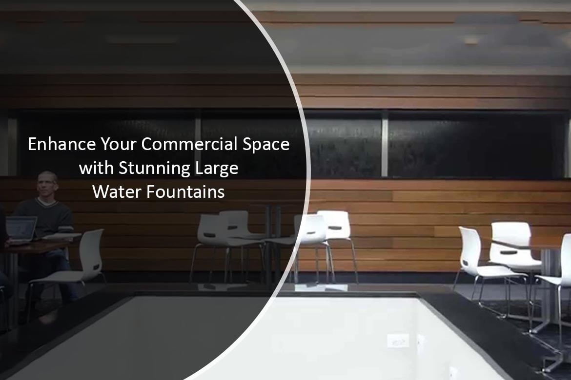 Large indoor water fountain enhancing commercial space with modern seating and wooden wall accents.