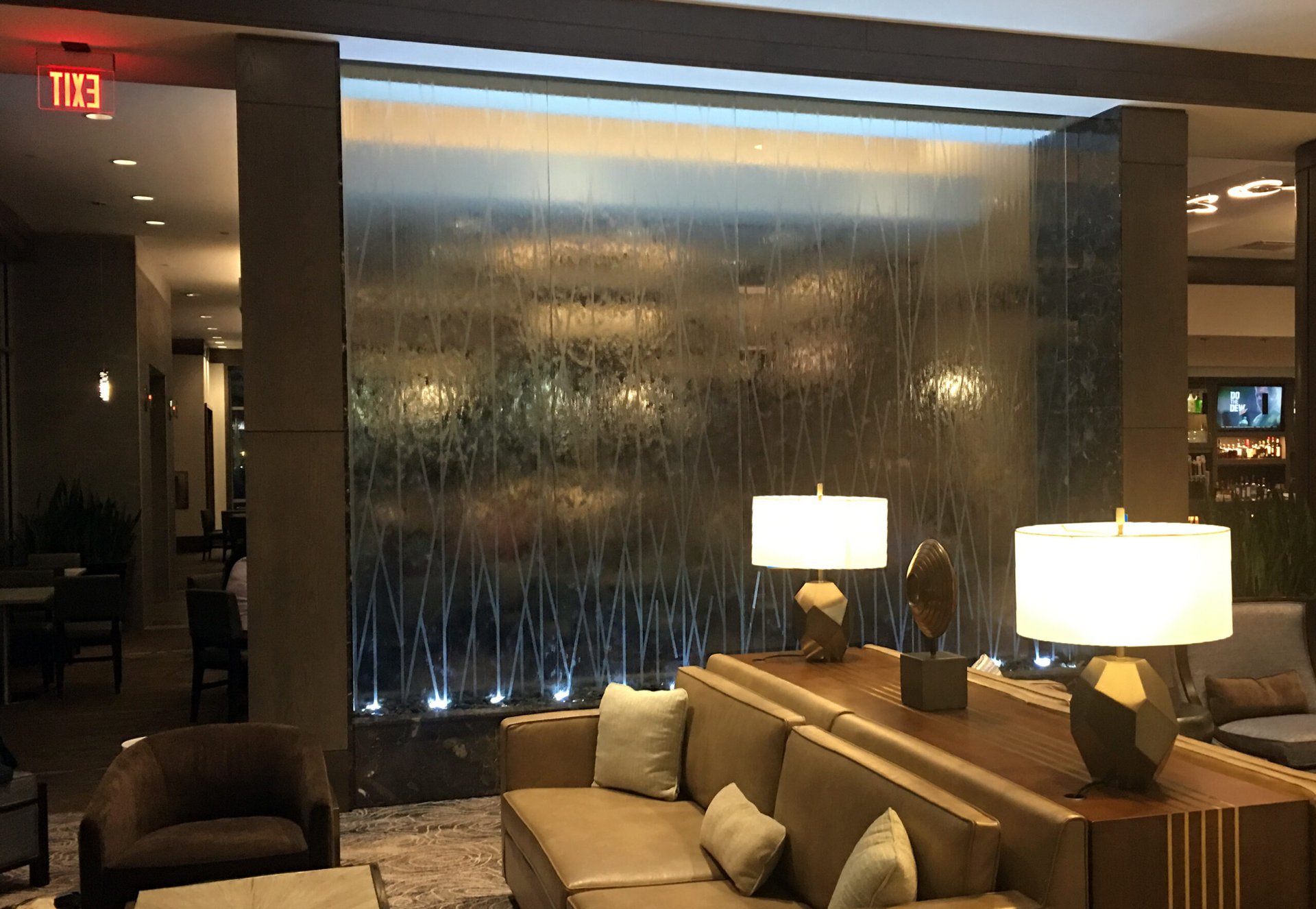 Glass Water Features 41 Glass Water Wall with Etching Logo Design at Embassy Suites Katy Texas scaled