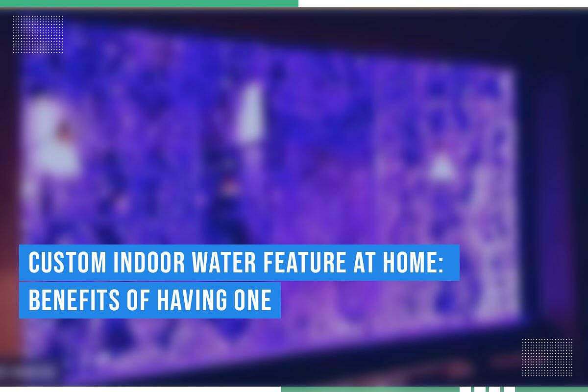 Custom indoor water feature with vibrant lighting, showcasing the benefits of having one at home, emphasizing tranquility and aesthetic appeal.