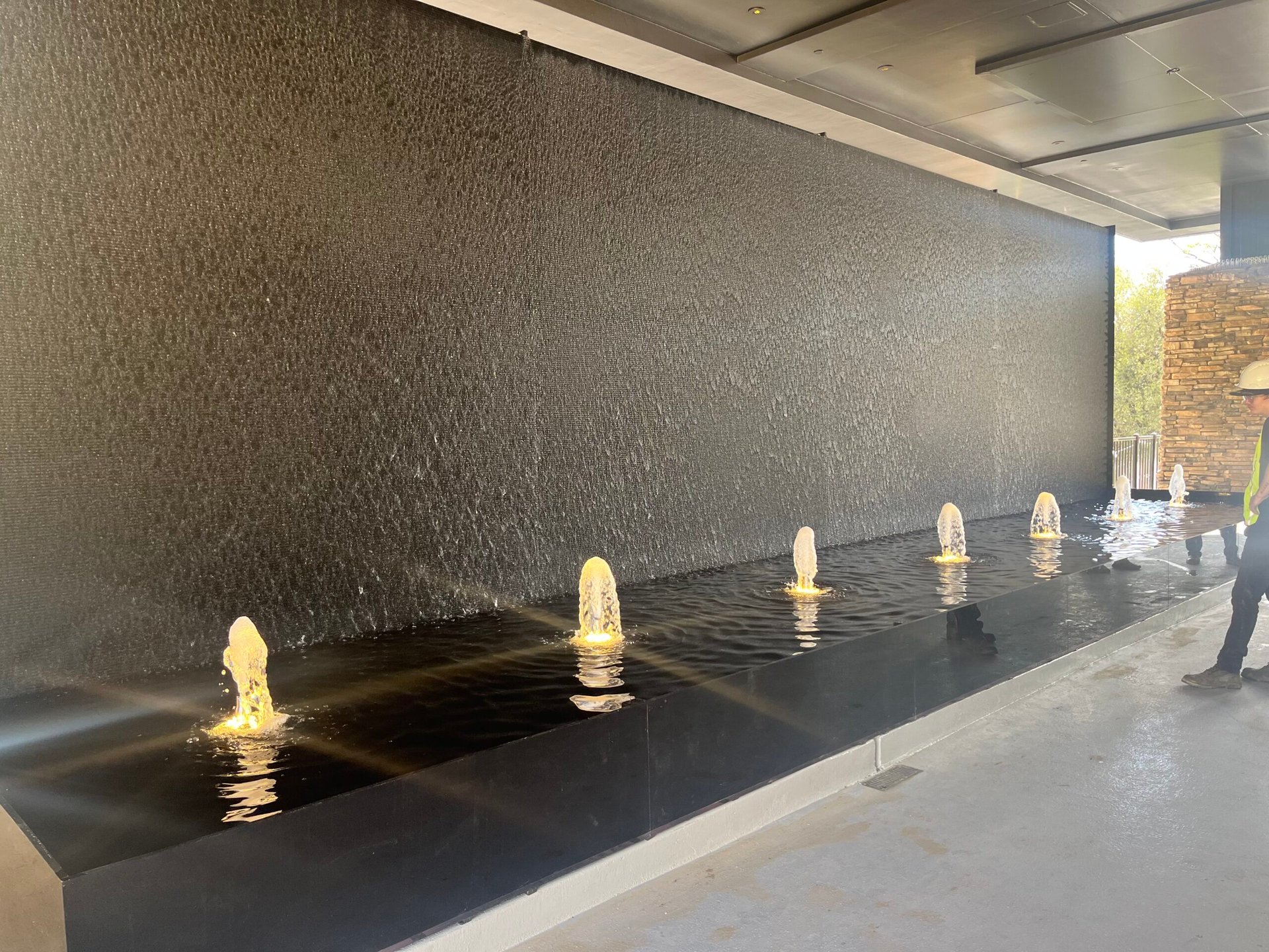 Specialty Fountains 22 Black Scored Acrylic Water Wall with Reflection Pool and Bubbler Jets at Black Oak Casino Seven Sisters Restaurant in Tuolumne California 1 scaled