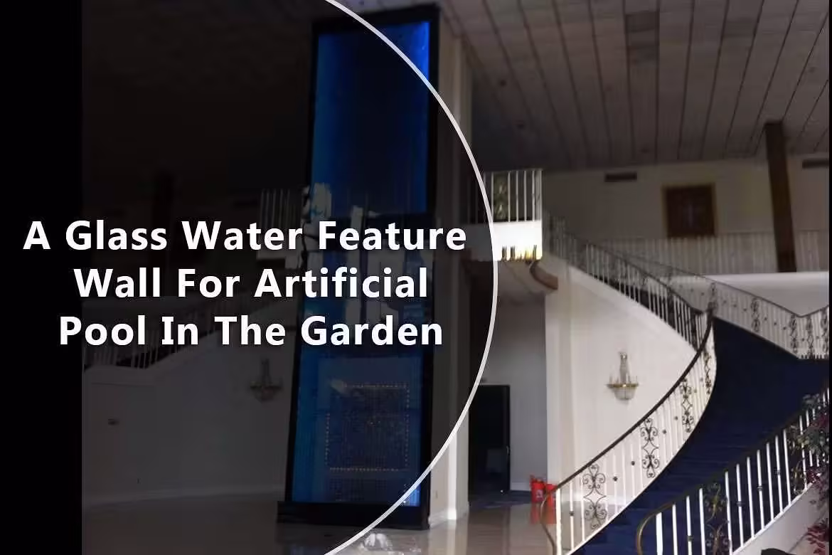 Glass water feature wall designed for an artificial pool in a garden, showcasing a modern aesthetic with flowing water, surrounded by elegant interior architecture and a grand staircase.