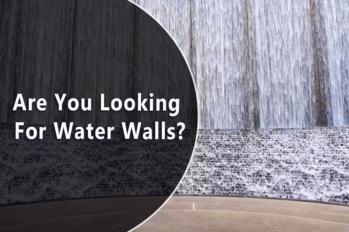 Indoor water wall feature with flowing water and text overlay asking, "Are You Looking For Water Walls?"