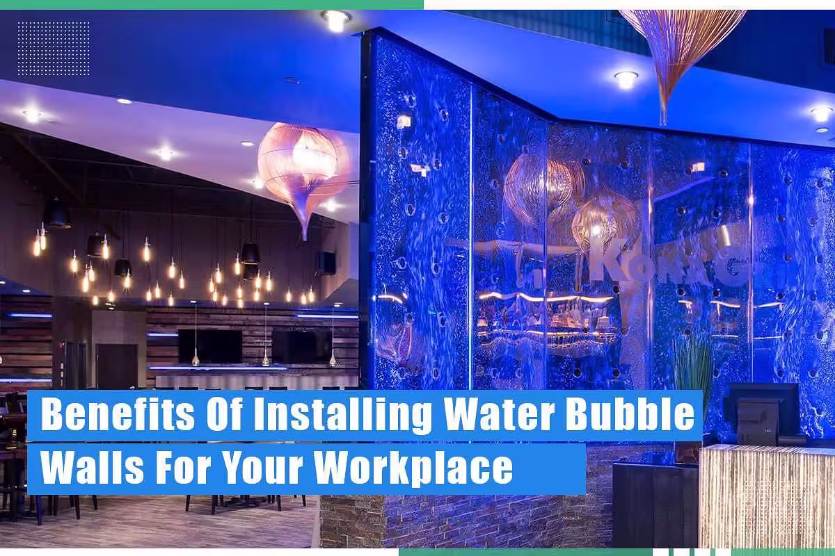 Water bubble wall installation in a modern commercial space, featuring blue lighting and decorative pendant lamps, enhancing workplace aesthetics.