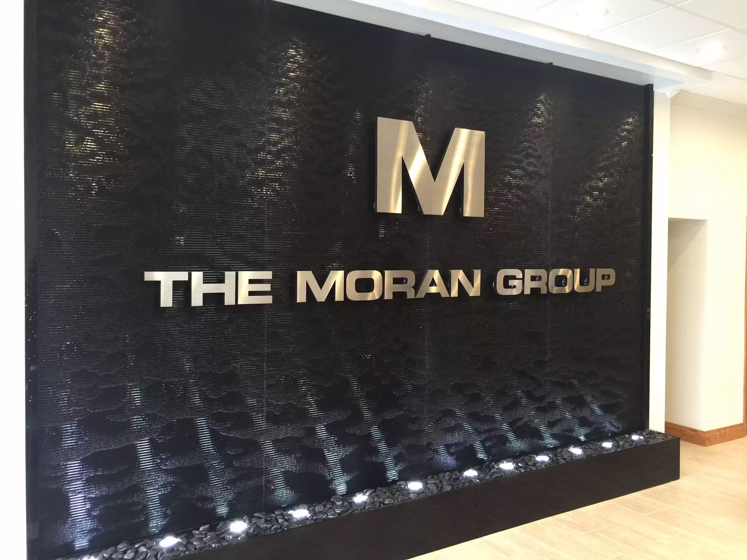 Black Scored Acrylic Water Wall Aquafall with Logo at FE Moran Offices in Northbrook, Illinois 2 Black Scored Acrylic Water Wall Aquafall with Logo at FE Moran Offices in Northbrook, Illinois 2