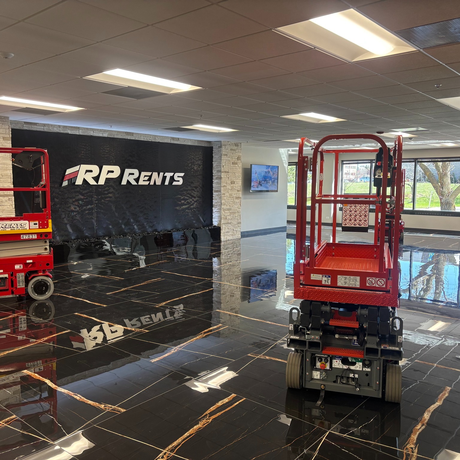 Black Scored Acrylic Water Wall with Logo for RP Rents in Naperville,, Illinois