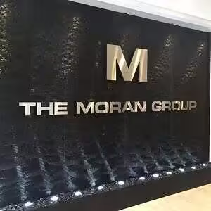 Black Scored Acrylic Water Wall Aquafall with Logo at FE Moran Offices in Northbrook, Illinois
