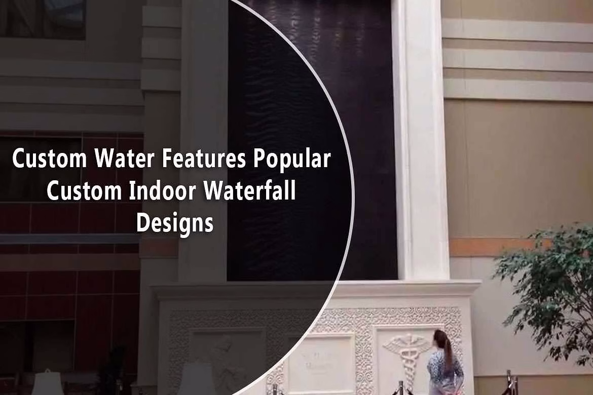 Custom indoor waterfall design featuring a large water wall, decorative stone base, and a person admiring the installation, showcasing popular custom water features by Midwest Tropical.
