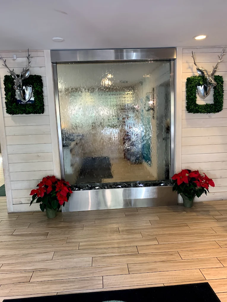 Mirror Glass and Stainless Water Wall at Palmetto Inn & Suites in Hilton Head, South Carolina