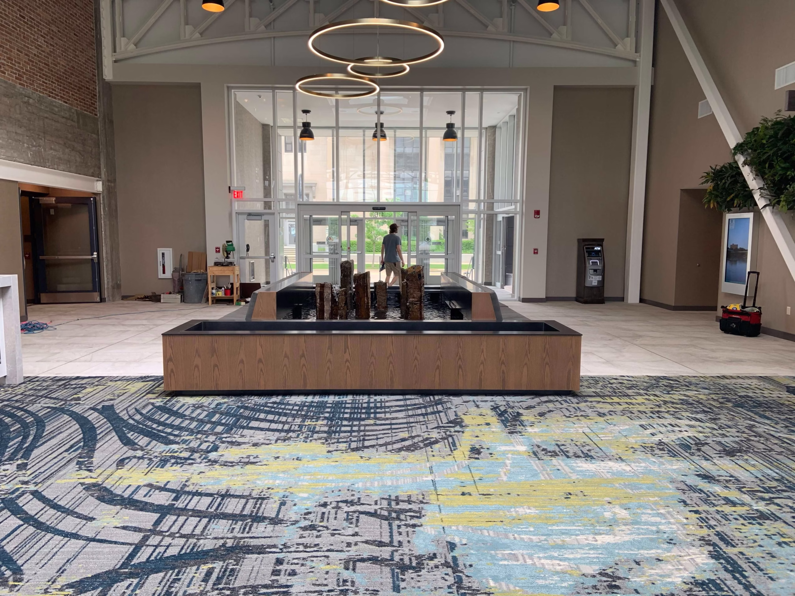 Specialty Fountains 5 Reflection Pool with Stone Sculptures Overflowing at Embassy Suites by Hilton Rockford Illinois scaled