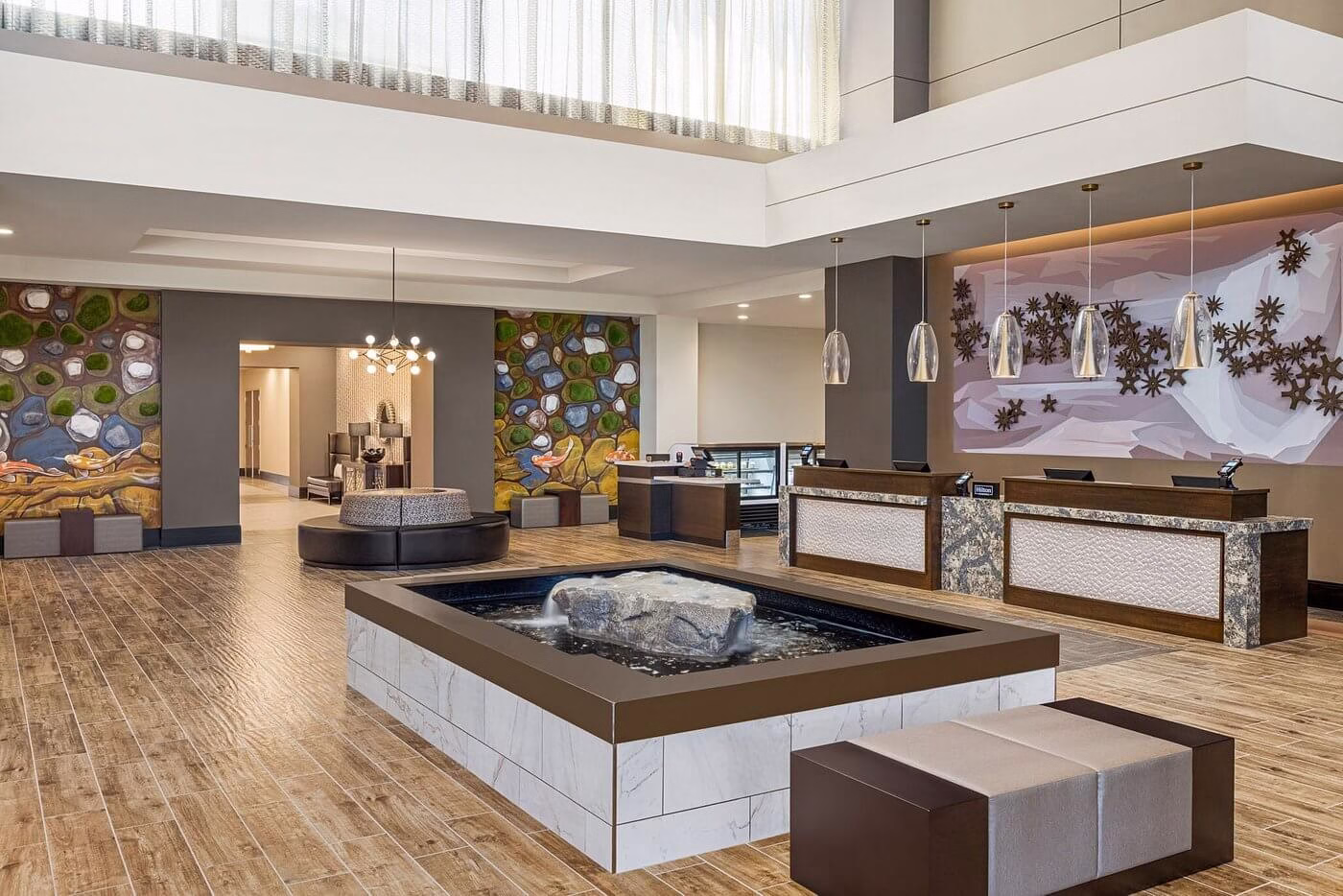 Specialty Fountains 4 Rock Overflowing with water with reflection pool at EMbassy Suites Round Rock Texas 1