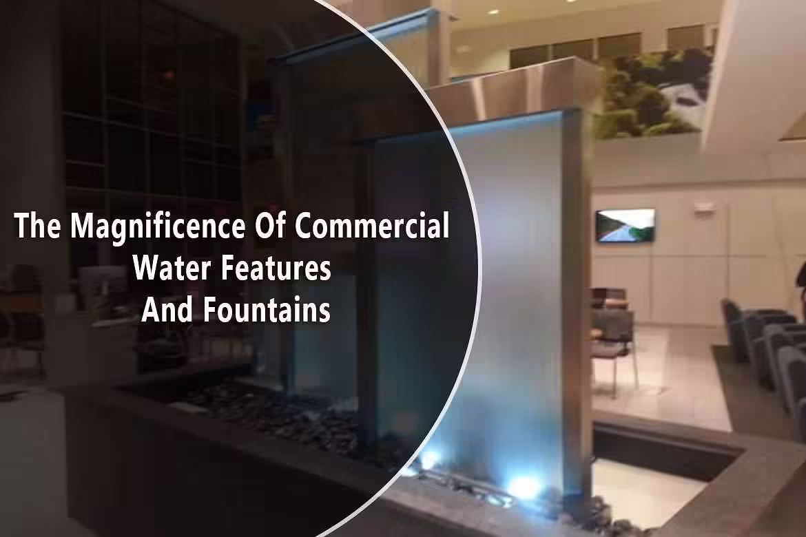 Commercial water feature with illuminated waterfall, showcasing the elegance of indoor fountains in a modern setting, emphasizing the beauty of custom water designs.
