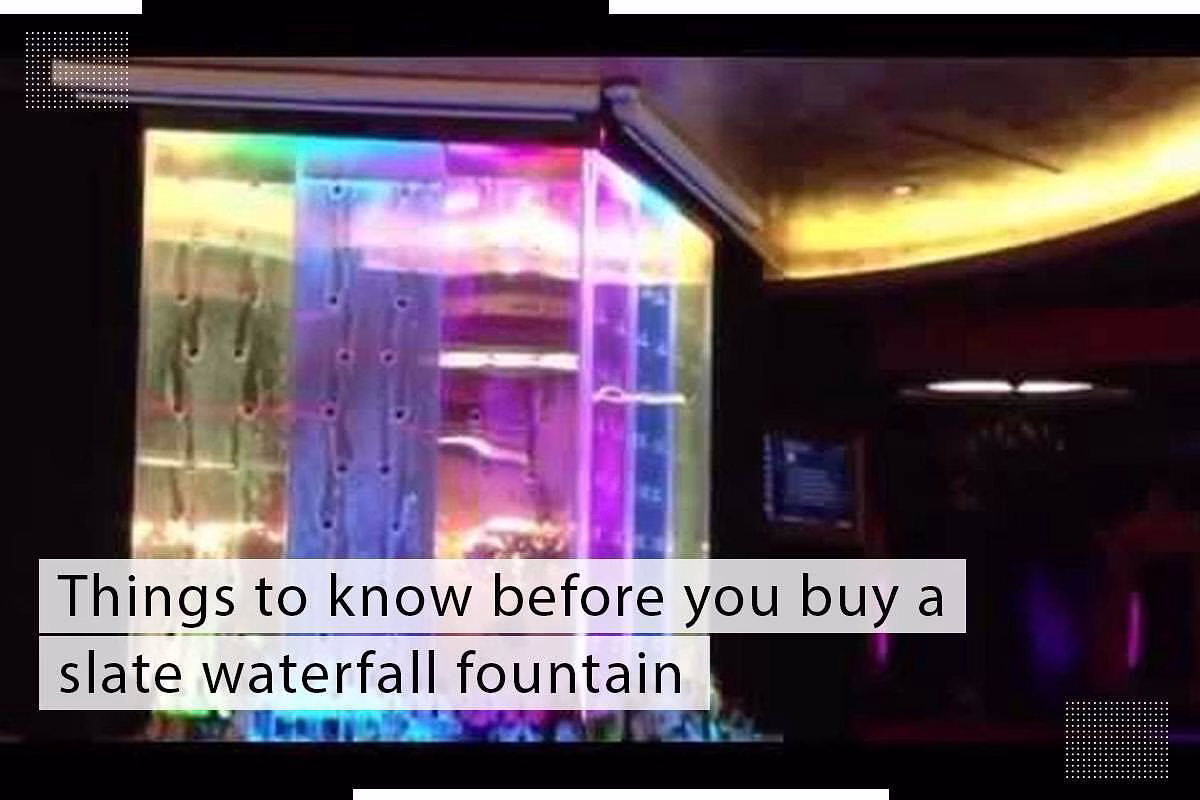 Slate waterfall fountain with colorful lighting, showcasing a modern water feature design, relevant to home decoration and water installations.