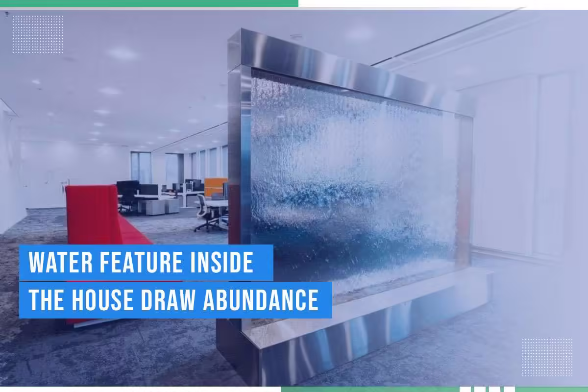 Water wall feature inside a modern office space, showcasing flowing water and reflecting light, enhancing ambiance and tranquility.