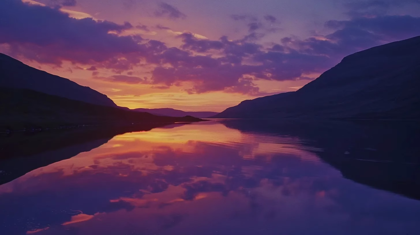 Stylish Garden Decor Options to Reflect Your Personality 6 a breathtaking sunset paints the sky in vibrant hues of orange and purple, casting a warm glow over a tranquil lake reflecting the silhouette of majestic mountains in the distance.