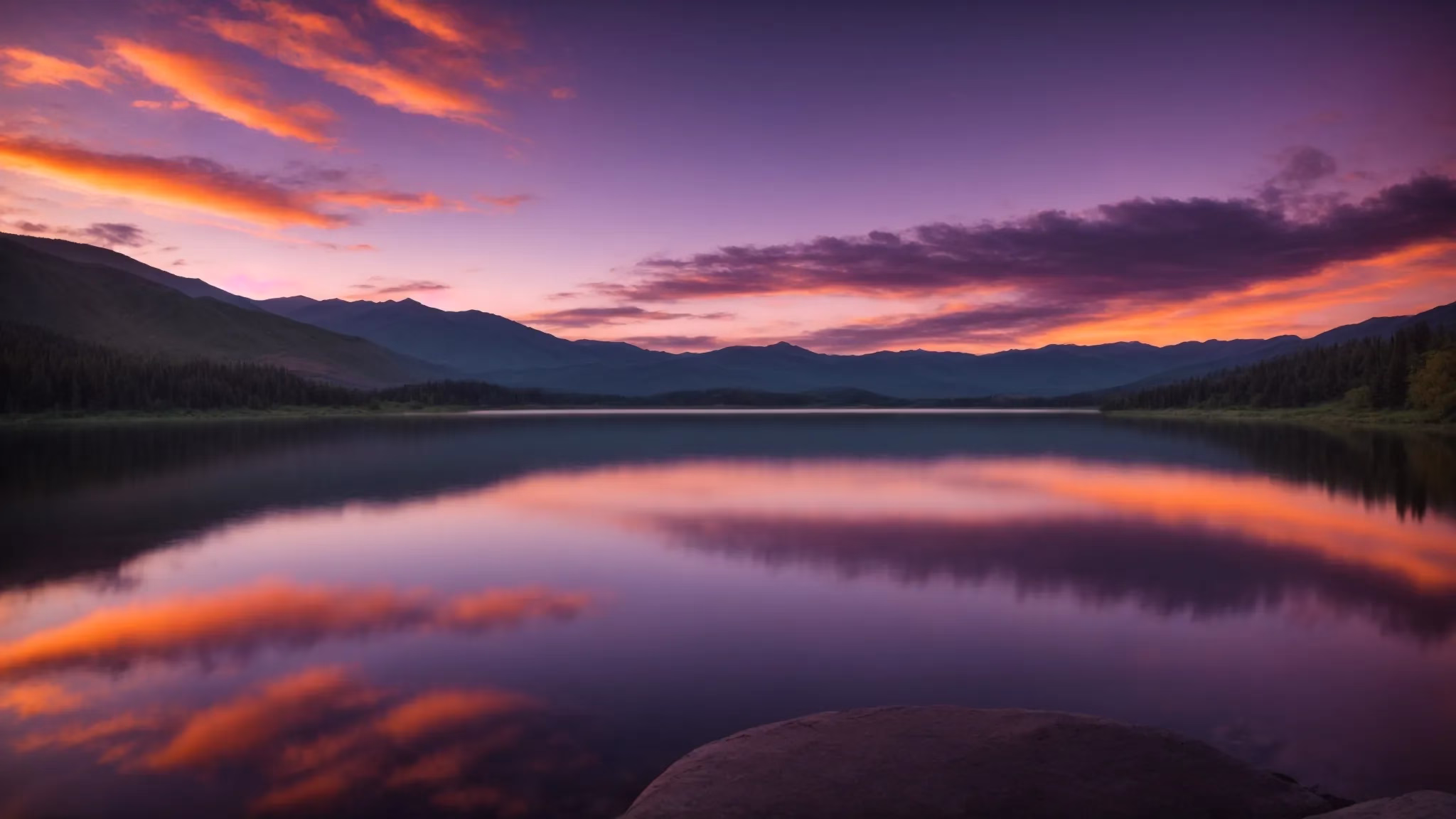Indoor Tabletop Arrangement Ideas to Inspire You 4 a majestic sunset casts vibrant hues of orange and purple over a tranquil lake, reflecting the colorful sky and surrounded by lush, green mountains, creating a serene and captivating atmosphere.
