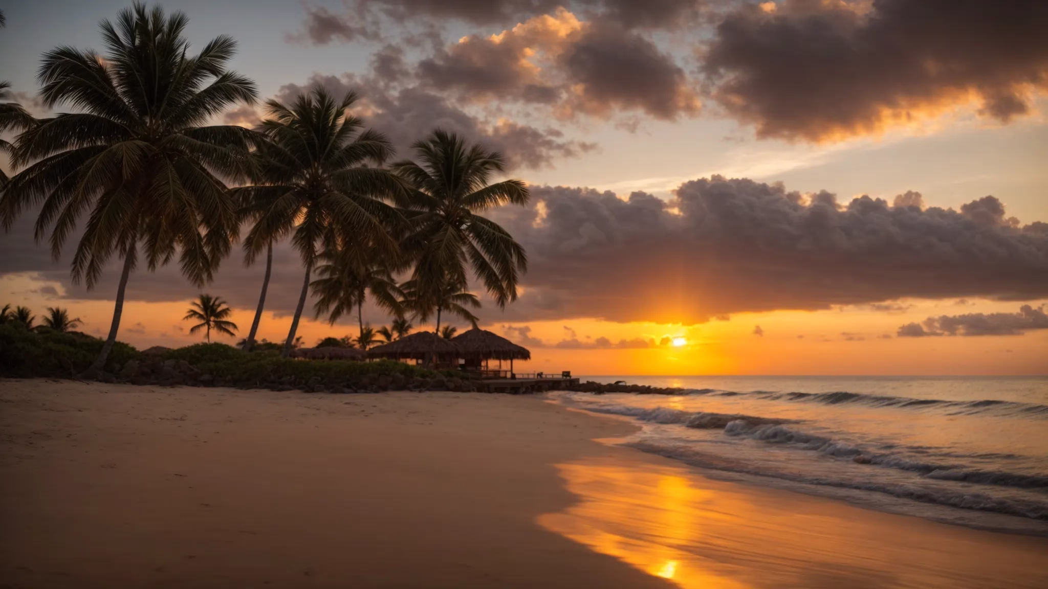 Modern Trends in Glass Indoor Decor 3 a vibrant sunset casts a warm golden glow over a tranquil beach, where gentle waves kiss the shore and silhouettes of palm trees sway gracefully in the breeze.