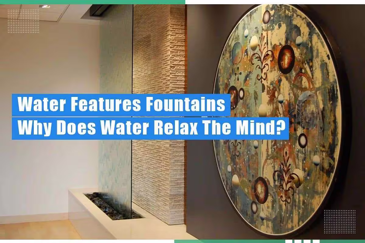 Water feature installation with glass waterfall and decorative round wall art, emphasizing relaxation benefits of water features in indoor spaces.