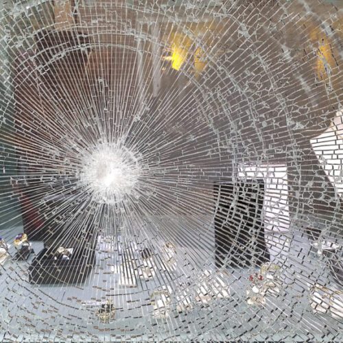 Broken window in jeweller's shop after raid Photo of a smashed window - M&N Insurance