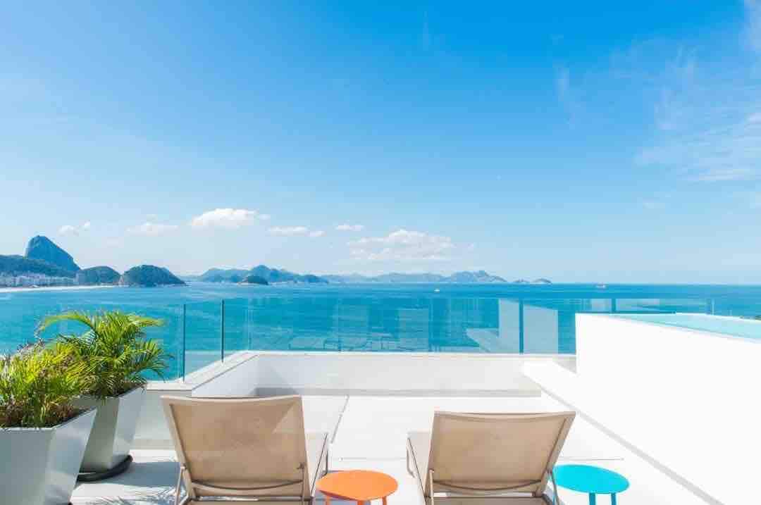 Exclusive terrace with pool and panoramic sea view.