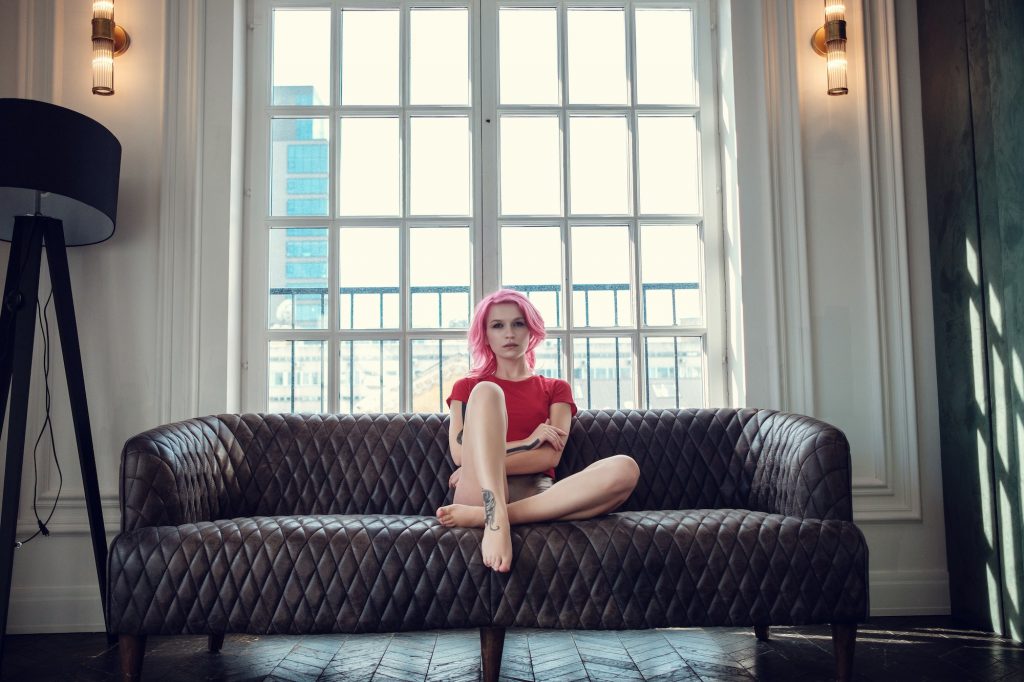 Lovely young woman posing in photo studio