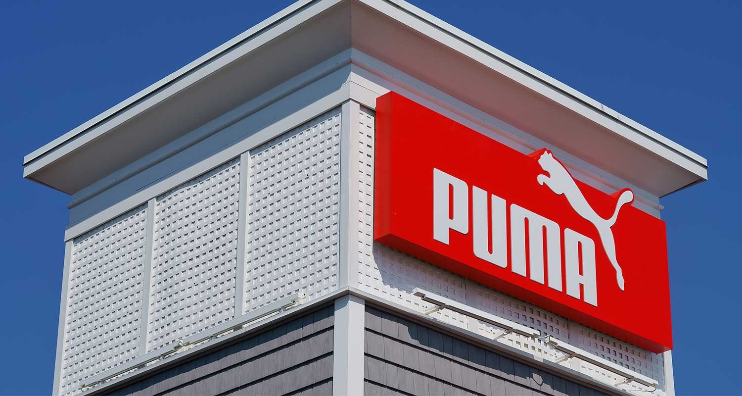 business-signage-cost-featured - City Signs of Texas cost of business signage like the puma logo on the top of this building.