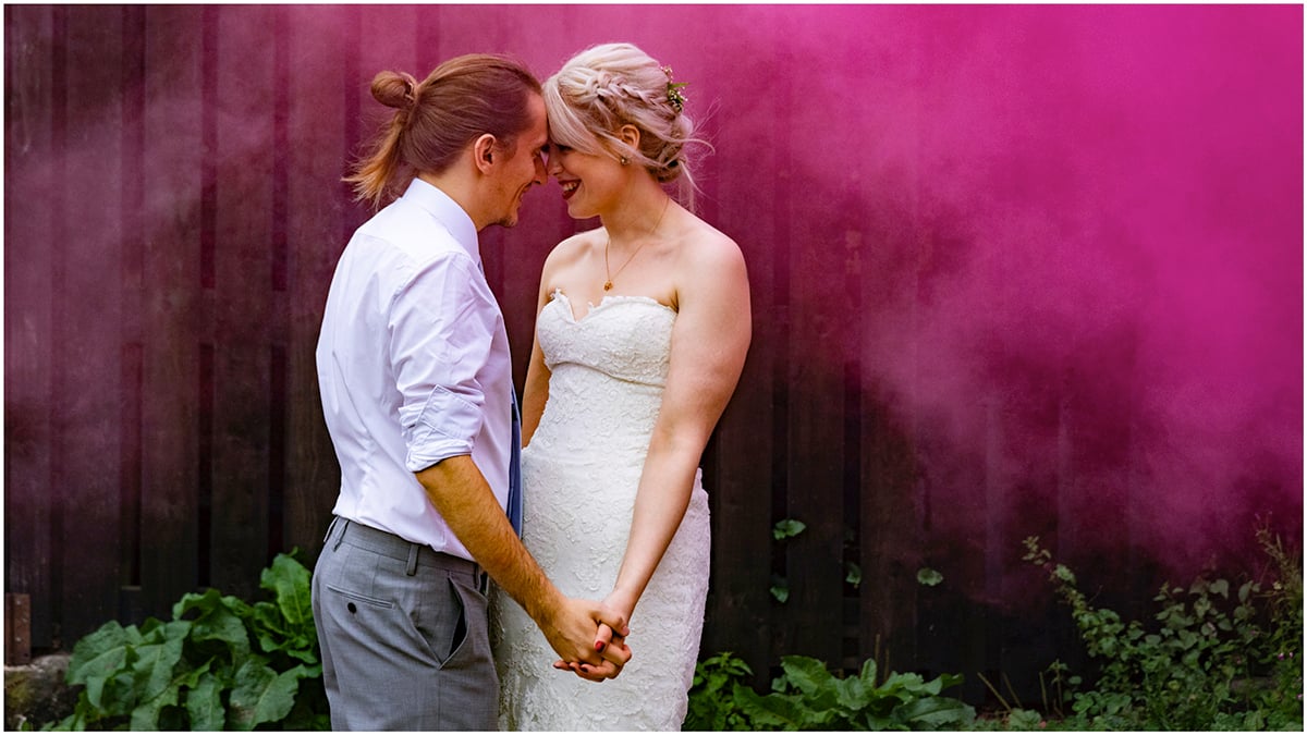 pink smoke bomb wedding photo grace ben curradine barns shrawley