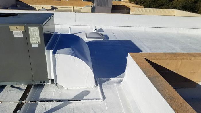 roof coating Tucson flat roof flat roof coated with white elastomeric roof coating in Tucson