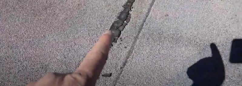 roofing contractor Tucson showing the need for commercial roof repair on a Tucson roof