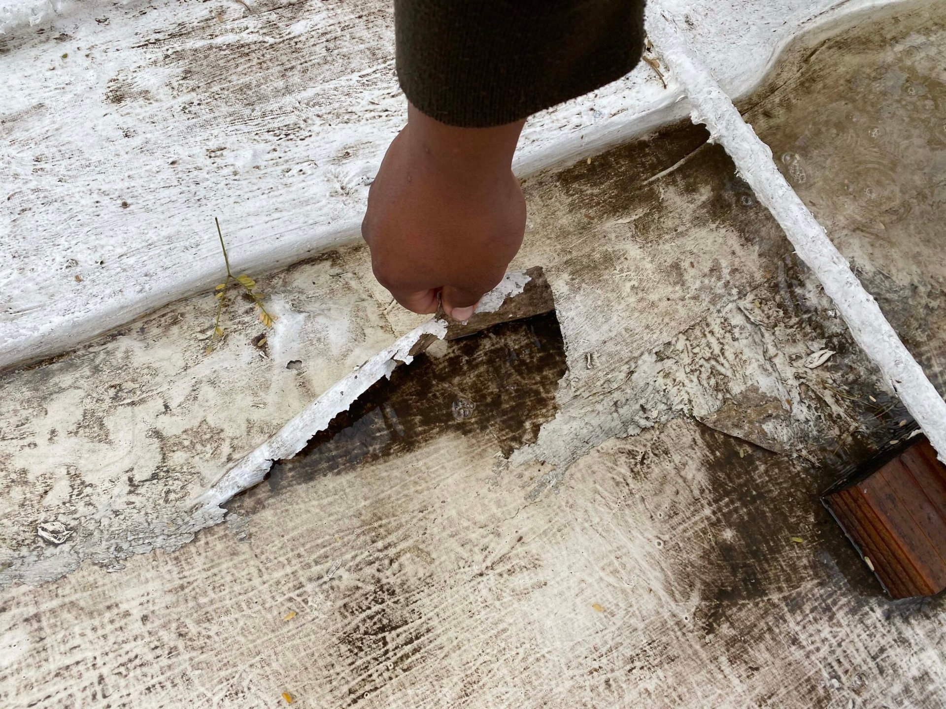 DC Roofing inspecting a roof inspecting a roof